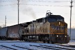 Westbound grain train leaves the yard